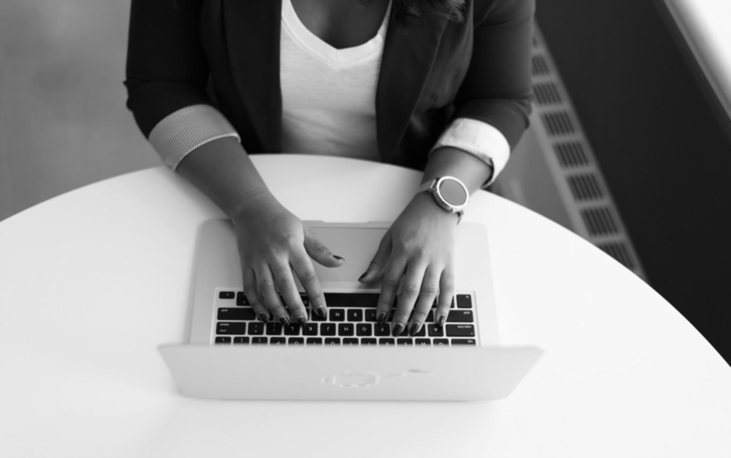 Developer workspace showing multiple monitors with code projects in progress